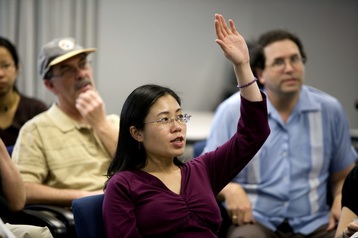 Adult Student Raising Her Hand